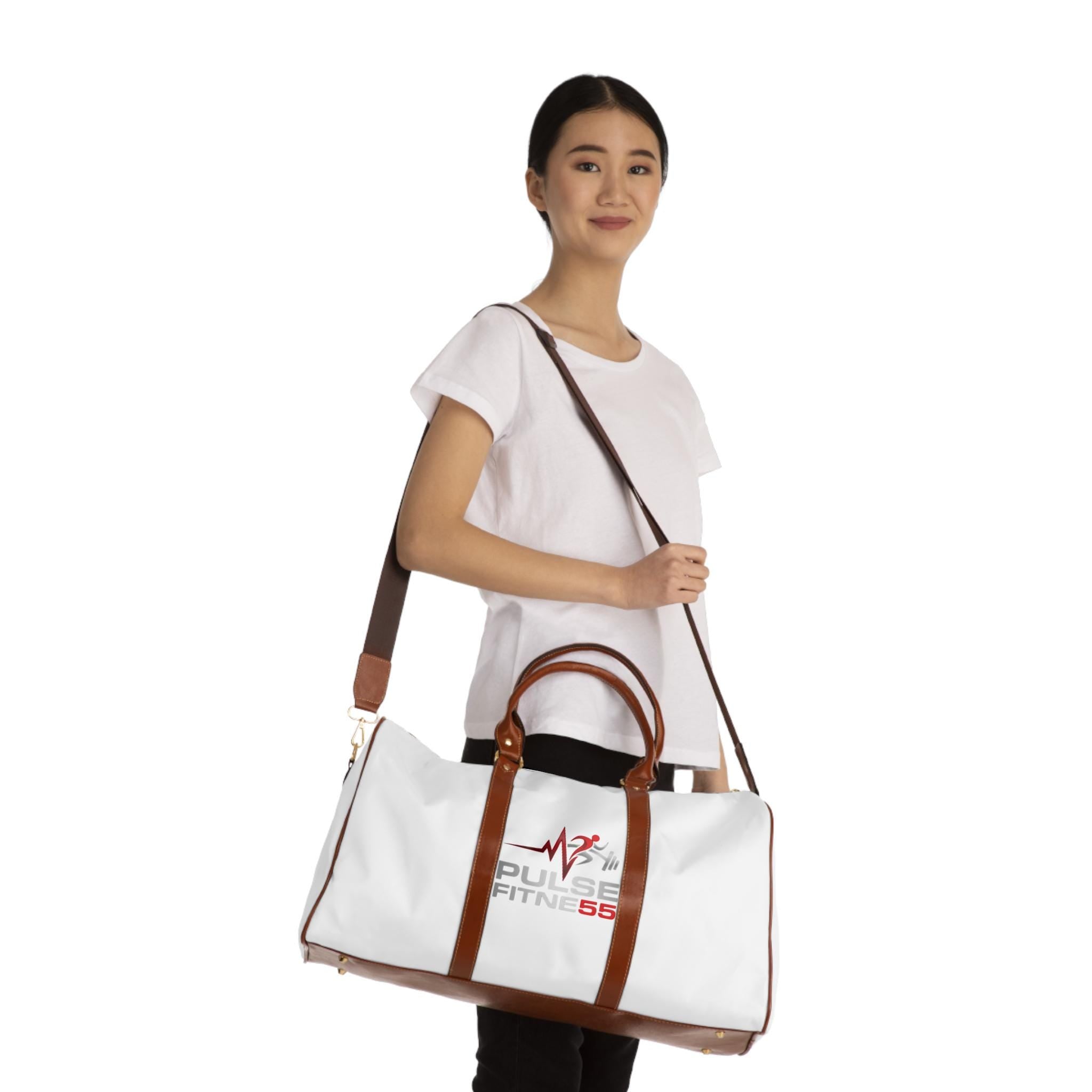 Pulse Fitness 55 Waterproof Travel Bag | Weightlifter Astronaut Duffle